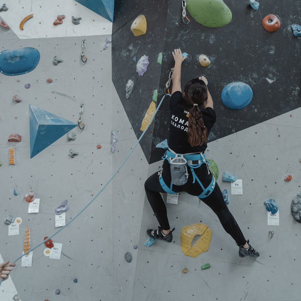 A person on a rock climbing wall